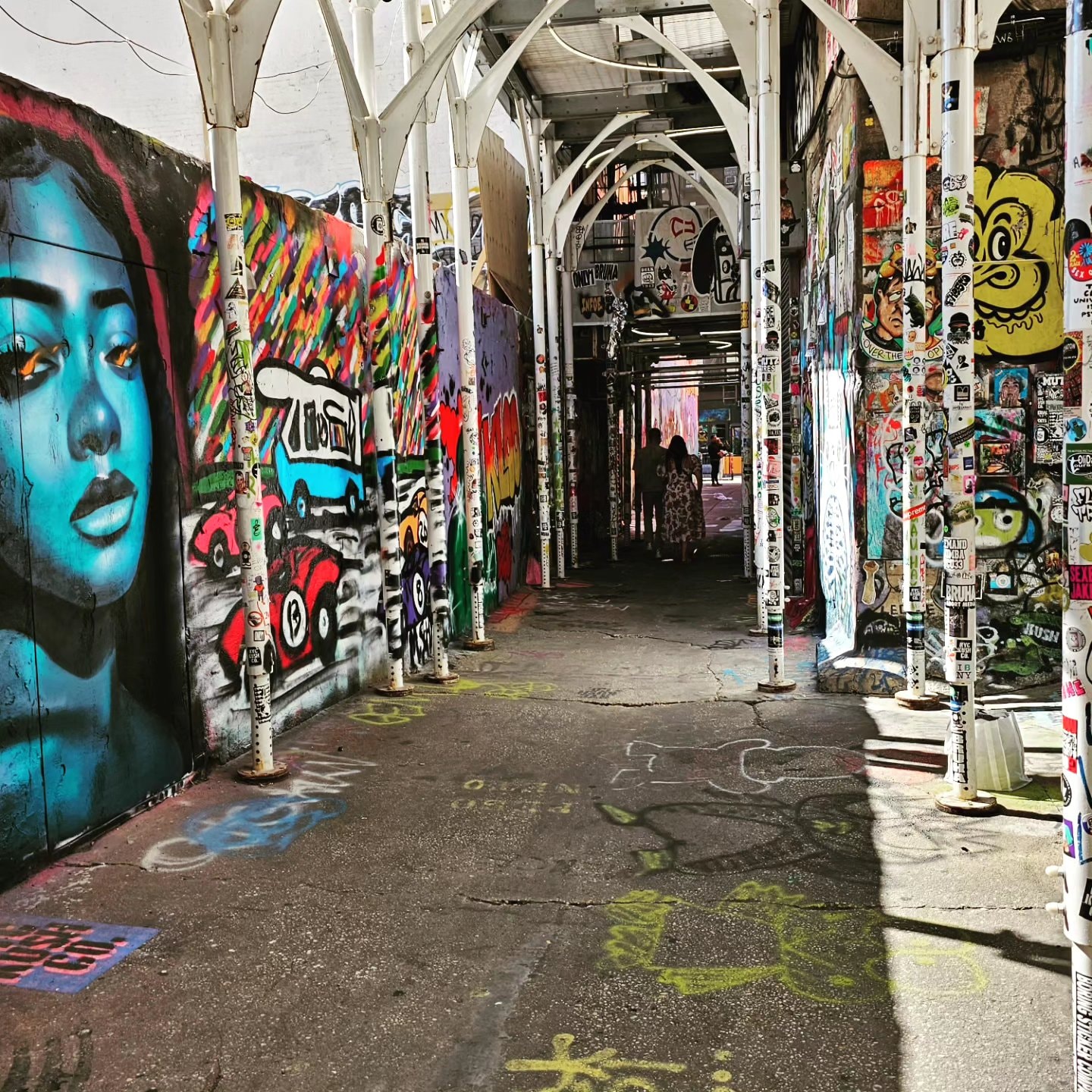 Da Race - Bushwick alley graffiti corridor with race car mural
