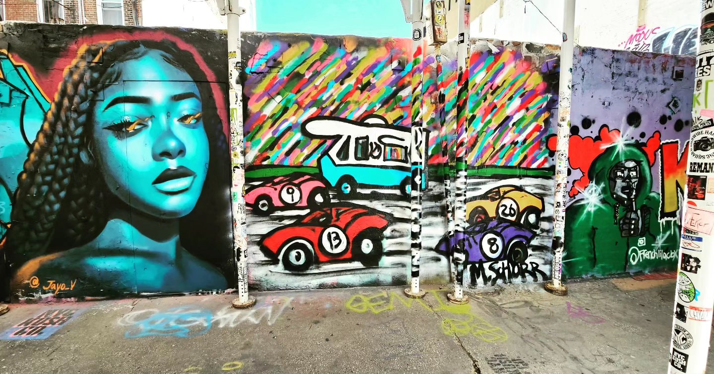 Da Race - Bushwick alley mural with race cars close up